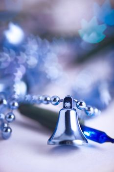 christmas bell with blue lights and dreamy bokeh