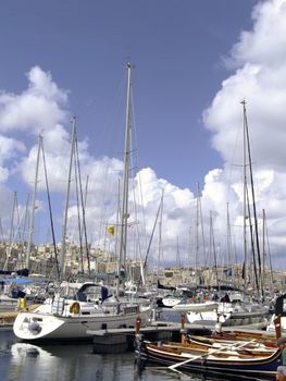 Beautiful yachts moored at the Vittoriosa Yacht Marina in Malta in the Med