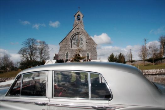 wedding car parked and waiting for the bride and groom