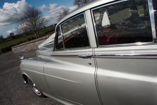 wedding car parked and waiting for the bride and groom