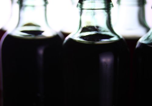 Soda pop bottles with blur.