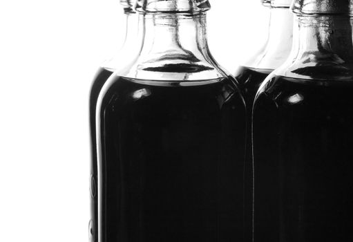 Soda bottles in black and white.