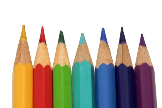 Line of pencils on white isolated with clipping path