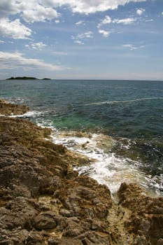 Coast line with cloudy sky