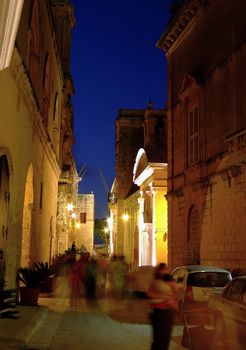 Medieval street by night, in the old city of Mdina in Malta