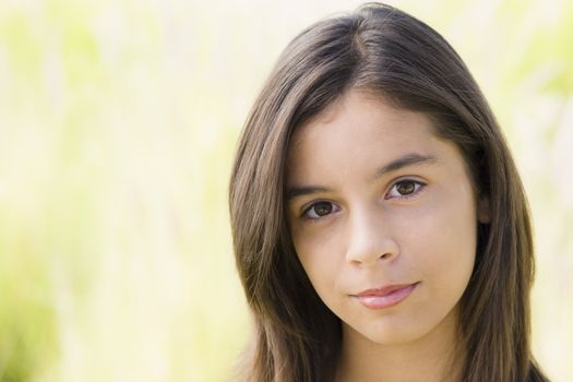 Hispanic Teenage Girl Looking Directly To Camera