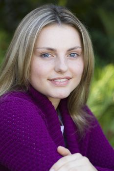 Closeup Portrait of a Smiling Pretty Blond Teen Girl