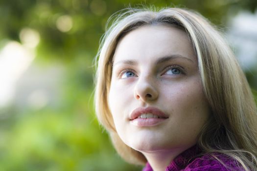 Closeup Portrait of a Smiling Pretty Blond Teen Girl