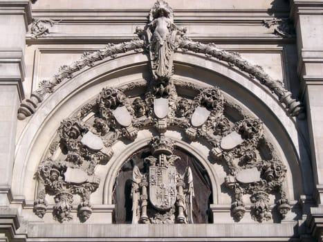 View of the Spain's Coat of Arms in the facade of the new Madrid's Major House, also known as Saint Mary of the Telecommunications.