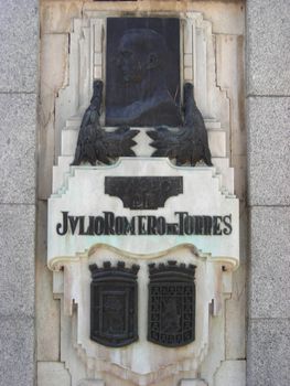 View of the street signal dedicated to the spanish painter Julio Romero de Torres walk in the Retiro Gardens, in Madrid