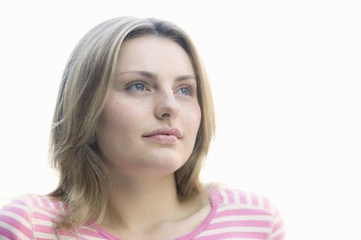 Portrait of a Pretty Blond Teen Girl Looking Away From Camera