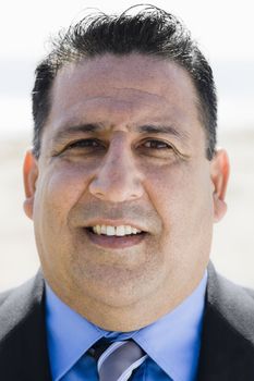 Portrait of Overweight Businessman Looking To Camera