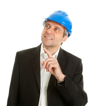 Portrait of successfull architect wearing blue hard hat and pointing. Isolated on white