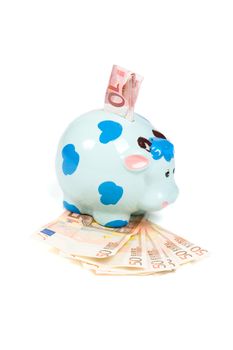  Piggy bank with money isolated on white background 

