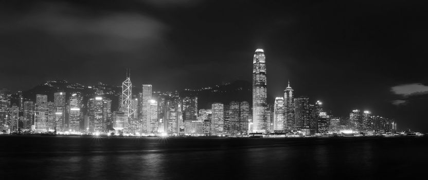 It is dramatical panoramic of Victoria harbor in Hong kong.