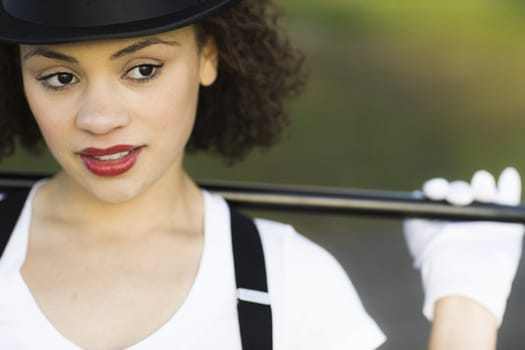 Portrait of Jazz Dancer in Tophat, Gloves and Suspenders