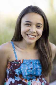 Portrait Of Tween Girl Smiling To Camera