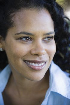 Portrait of African American Woman Smiling and Looking Away From Camera