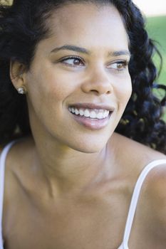 Portrait of African American Woman Smiling and Looking Away From Camera