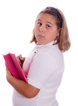 A young girl trying to hide her diary, isolated against a white background