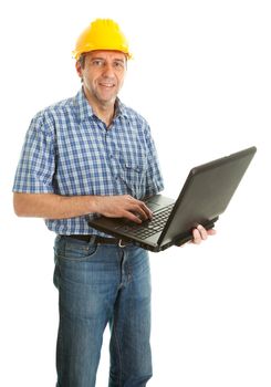 Confident worker wearing hard hat and using laptop. Isolated on white