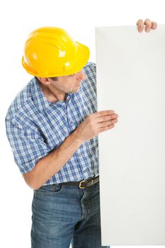 Confident worker presenting empty board. Isolated on white