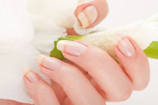 Beautiful nails and fingers over isolated white