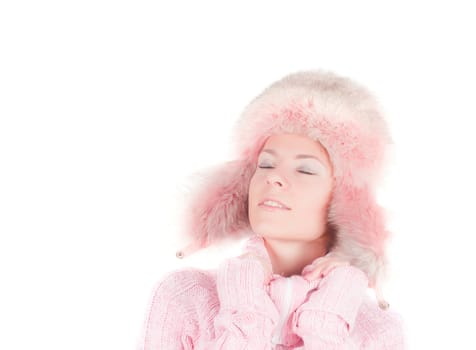 Beautiful woman in pink fur hat, isolated on white