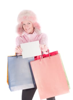 Beautiful woman in pink fur hat, isolated on white