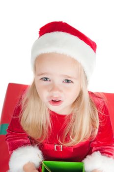 Christmas toddler with present boxes, studio shot