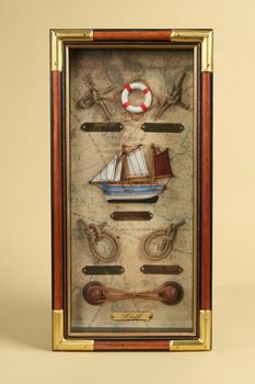 Accessory of sailor - souvenir in wooden frame.

