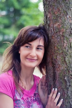 Shot of young beautiful brunette woman outside