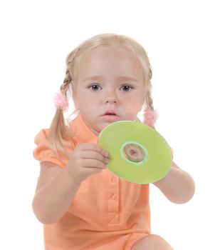 Shot of little girl with CD in studio