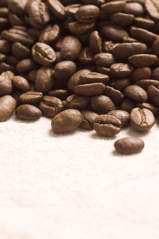 Roasted coffee beans on jute sacking