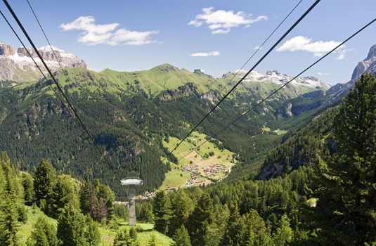 Aerial view of Fassa valley from Alba di Canazei to Fedaia pass