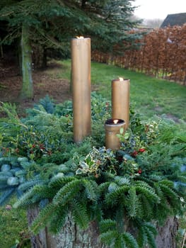 Christmas spruce tree Europen Holly corners and festive candles lights