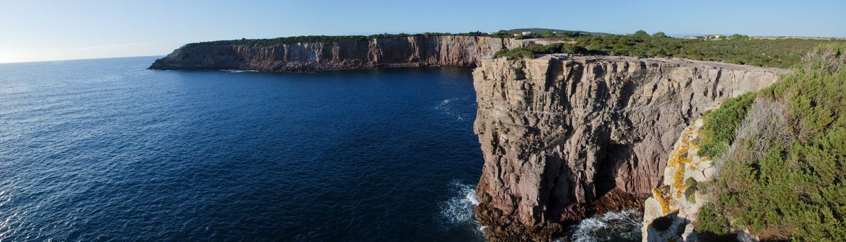 A cliff over the sea in a sunny day