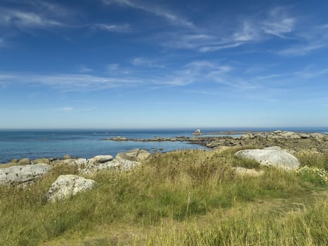 Rocky beach by the Atlantic sea in a beautiful summer day.