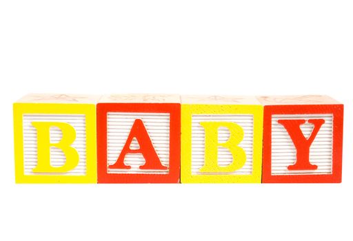 baby written in wooden blocks isolated on white