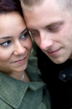 A young happy couple gazing into each others eyes.