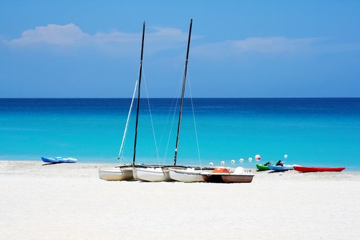 Katamarans and water bicycles in a beach