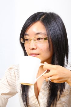 Chinese businesswoman drinking coffee