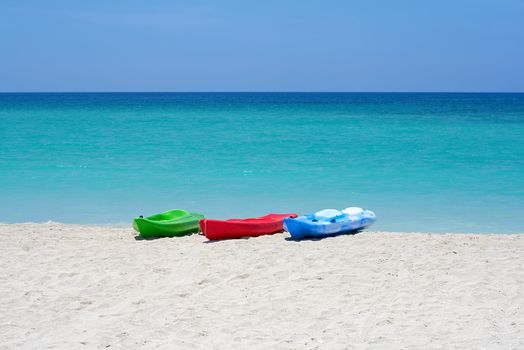 Group of kayaks ready to be rented in a beach