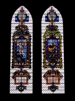 Colored glass windows in the Salisbury  Cathedral isolated on black