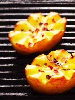 close up of baked potatoes