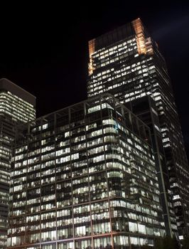 View of Canary Wharf skyscrapers in London at night