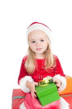 Christmas toddler with present boxes, studio shot