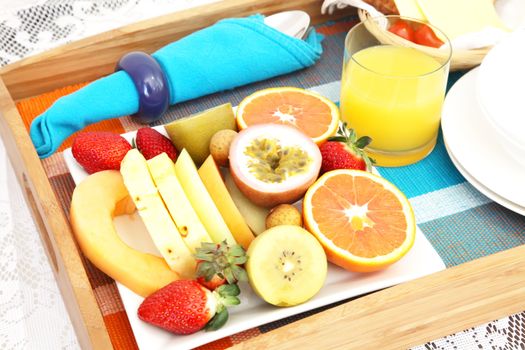 Breakfast in Bed with Assorted Fruits and Juice