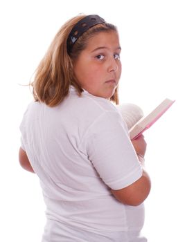 A young girl reading her private diary, isolated against a white background
