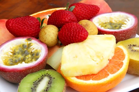 Fresh Fruits Sliced and Assorted on a Plate